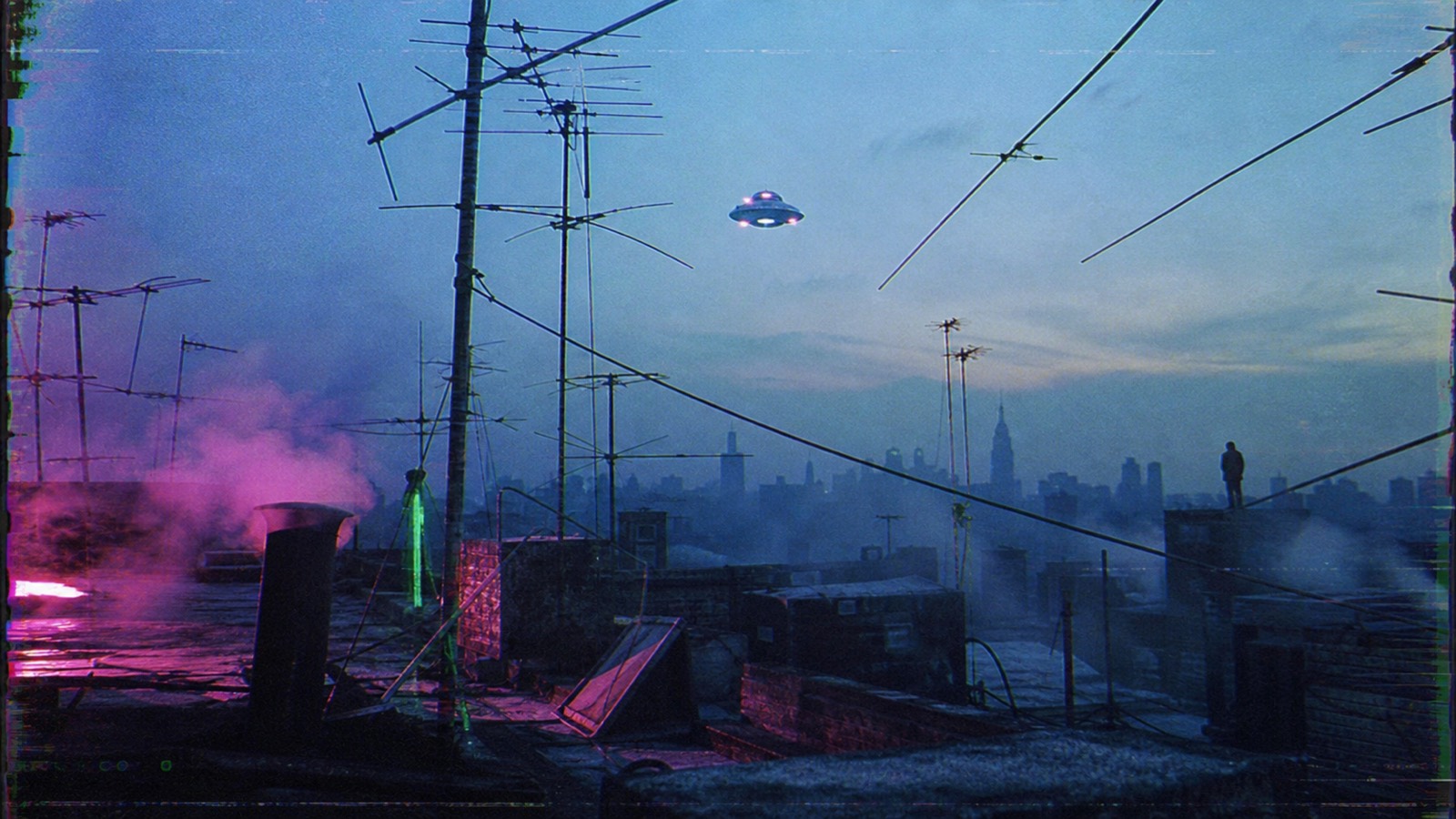 Tiny UFO above a Manhattan rooftop antenna forest
